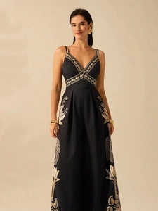 Elegant black sleeveless V-neck jumpsuit with floral embroidery and wide leg design