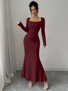 Detail of elegant wine red fishtail dress featuring square neck and slim ruffled waist