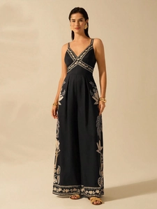 Elegant black V-neck sleeveless jumpsuit with floral embroidery and wide legs for vacation