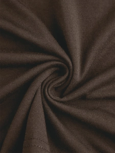 Macro shot of dark coffee brown knitted fabric texture with soft spiral draped pattern