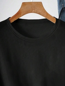 Close-up of black crew neck T-shirt neckline with durable double-needle stitching detail