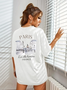 Detail of white cotton T-shirt featuring Paris street art print and drop shoulder design