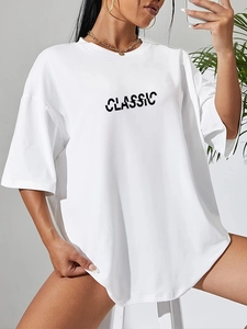 Modern oversized white T-shirt with black CLASSIC print and dropped shoulder design