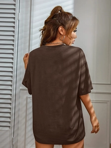 Back view of dark brown oversized cotton T-shirt with drop shoulders and loose fit