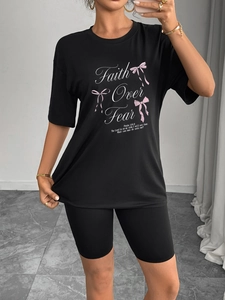 Ensemble sport femme noir deux pièces avec imprimé Faith Over Fear et short cycliste