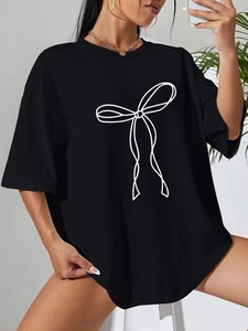 T-shirt oversize da donna nera in cotone con stampa a fiocco bianco e girocollo