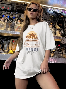 White oversized t-shirt with palm tree graphic and Sunshine State of Mind text