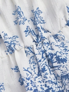 Women's blue floral print camisole featuring elasticated details and white striped fabric