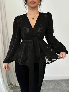 Women's black V-neck lace long sleeve top with floral pattern and peplum waist tie
