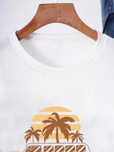 Detail of white cotton T-shirt featuring a retro sunset and palm tree graphic print