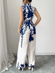 Women's sleeveless wide-leg jumpsuit with blue floral print and high neck for summer