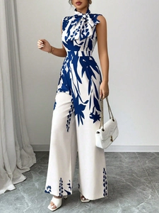 Women's sleeveless floral wide-leg jumpsuit with waist tie and botanical print