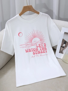Casual white crewneck T-shirt with pink sunset and moonrise graphic print for women