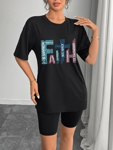 Women black Faith graphic t-shirt with oversized fit and crew neck streetwear style