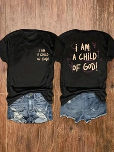 Front and back view of black cotton T-shirt with 'Child of God' print and denim shorts