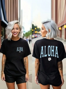 T-shirt nera da donna in cotone con stampa Aloha blu e fiori di ibisco bianchi