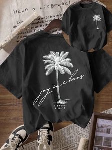 T-shirt nera a girocollo con stampa di palma bianca e scritta Joy in Chaos