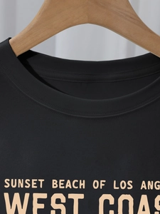 Women's black crew neck cotton T-shirt with Los Angeles sunset beach graphic print