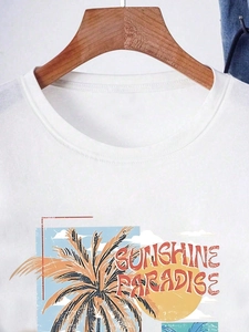 T-shirt blanc en coton avec imprimé vintage palmier sunshine paradise sur cintre
