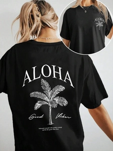 T-shirt da donna nera casual con stampa grafica Aloha e palma sulla schiena