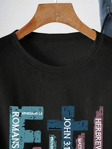 Detail of black crew neck T-shirt featuring colorful bible verse names print on chest