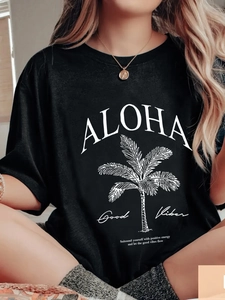 Relaxed black women's cotton T-shirt featuring white Aloha palm tree graphic print