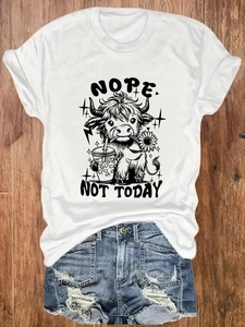 Dettaglio della grafica mucca delle Highlands e scritta Nope Not Today su T-shirt