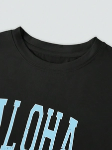 Damen T-Shirt in Schwarz mit Rundhalsausschnitt und Vintage Aloha-Aufdruck im Streetstyle