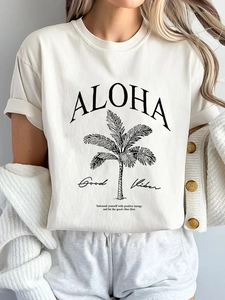 Women's crew neck short sleeve Aloha t-shirt with palm tree print in casual cream white