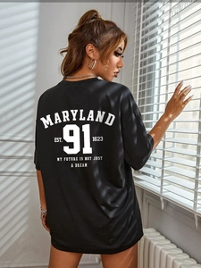 Détail du t-shirt noir ample avec imprimé Maryland 91 blanc au dos en coton de qualité
