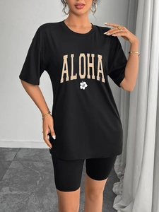Women black two-piece sports set with Aloha print T-shirt and cycling shorts