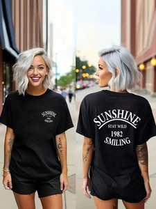 T-shirt femme en coton noir avec imprimé graphique Sunshine Stay Wild et col rond classique