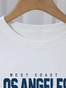 White crew neck t-shirt with vintage Los Angeles West Coast printed graphic on the chest