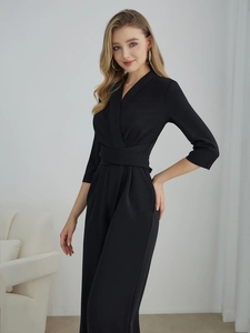 Elegant women's black V-neck jumpsuit with short sleeves and wide legs for spring season