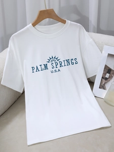 Women's loose white round neck T-shirt with Palm Springs sun graphic print design