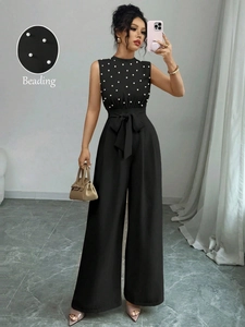 Élégante Combinaison Noire Sans Manches Pour Femmes Perlé Jambe Large Taille Haute Romper Avec Ceinture Nœud Pour Soirée