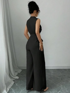 Combinaison pantalon noire sans manches élégante avec perles et jambes larges pour femme