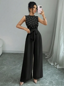 Combinaison pantalon noire sans manches à jambes larges avec perles et ceinture