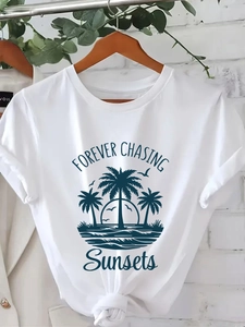 White crew neck T-shirt with Forever Chasing Sunsets graphic and beach scene print