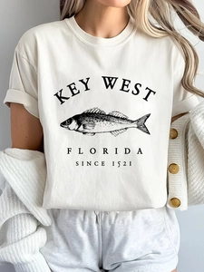 Women's cream crew neck T-shirt with vintage Key West fish print in a relaxed style