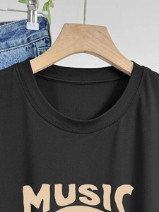 T-shirt noir col rond pour femmes avec impression de texte MUSIC et style décontracté