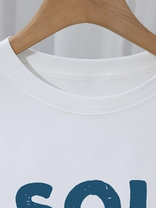 T-shirt blanc en coton à col rond avec imprimé de lettres vintage SOL sur cintre