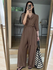 Elegant dark brown V-neck wide-leg jumpsuit with waist tie and long sleeves for women