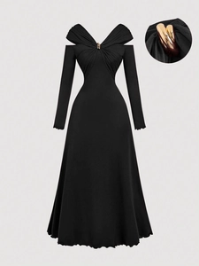 Elegant black long-sleeved A-line dress with V-neck, metal buckle and pleated details
