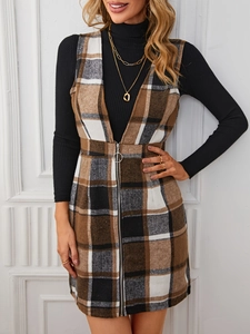 Détails de la veste sans manches à carreaux pour femme avec zip et texture en laine
