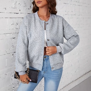 Women's light grey quilted knit cardigan jacket with silver buttons and diamond texture