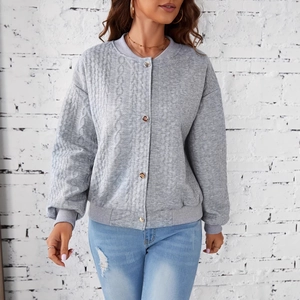 Women's grey quilted knit baseball jacket with button closure and ribbed trim