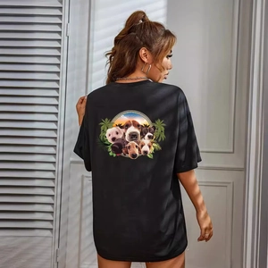Women's black oversized T-shirt with puppy back print and palm leaf graphics