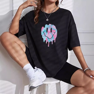 Women's black casual t-shirt with colorful melting smiley print and matching cycling shorts