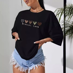 Women's black oversized t-shirt with heart graphic and eternal love print